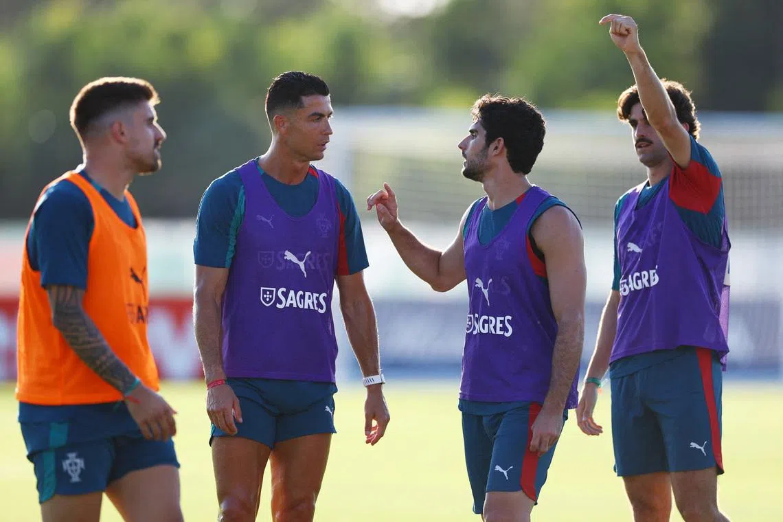 Portugal's Cristiano Ronaldo, Goncalo Guedes and Francisco Trincao during training.