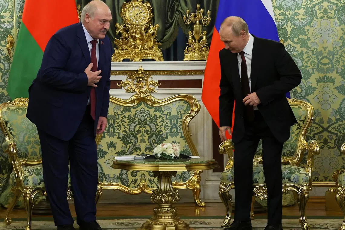 FILE PHOTO: Russian President Vladimir Putin and Belarusian President Alexander Lukashenko arrive for a meeting at the Kremlin in Moscow, Russia October 9, 2024. Sergei Ilnitsky/Pool via REUTERS/File Photo