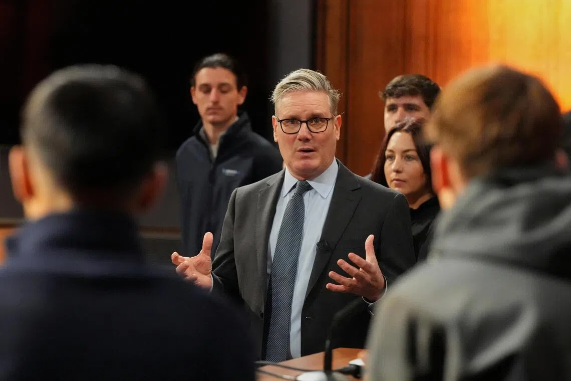 British Prime Minister Keir Starmer taking part in a Q&A session on youth employment and the cost of living with apprentices in London, on Nov 17.