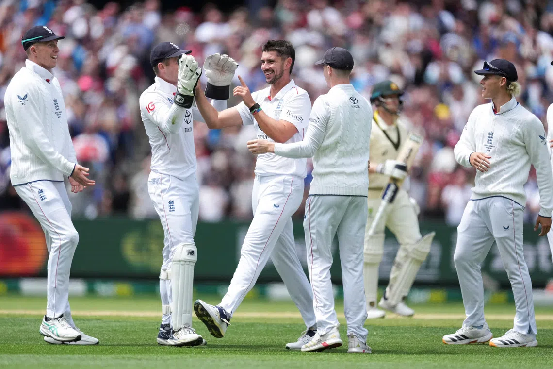 Cricket - The Ashes - Australia v England - Fourth Test -  MCG, Melbourne, Australia - December 26, 2025 England's Josh Tongue reacts after getting the wicket of Australia's Steve Smith.   REUTERS/Asanka Brendon Ratnayake