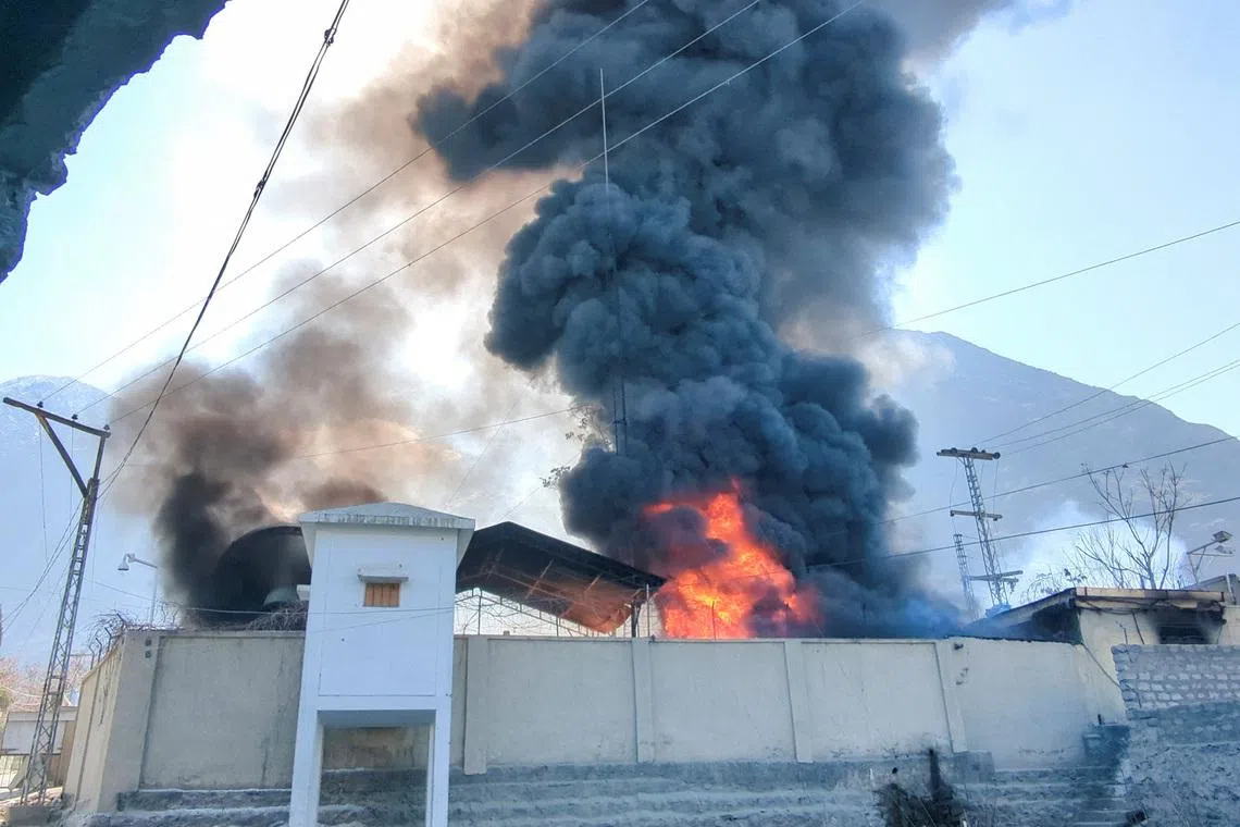 Smoke and flames rise from the premises of the U.N. office, after it was set ablaze by protesters, following news of U.S. and Israeli strikes on Iran that killed supreme leader Ayatollah Ali Khamenei, in the city of Gilgit, Gilgit Baltistan, Pakistan March 1, 2026. Picture taken with a mobile phone. REUTERS/Mubarak Hussain