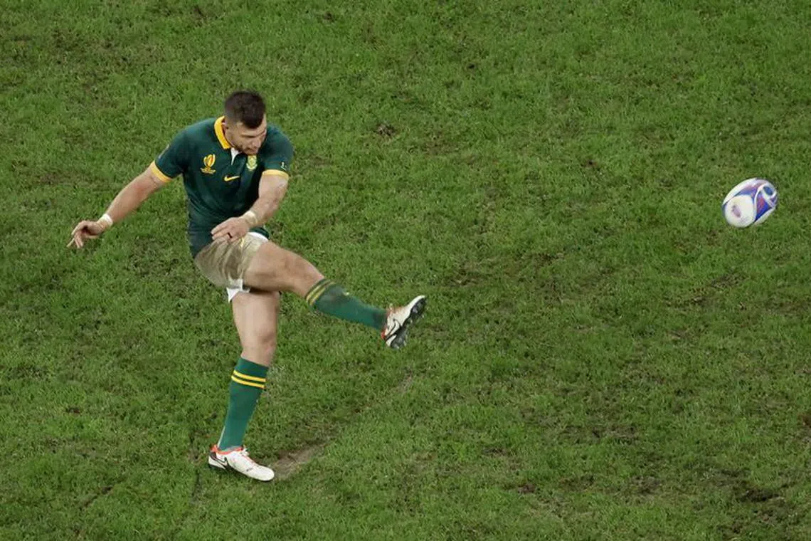Rugby Union - Rugby World Cup 2023 - Final - New Zealand v South Africa - Stade de France, Saint-Denis, France - October 28, 2023  South Africa's Handre Pollard does a drop kick REUTERS/Peter Cziborra