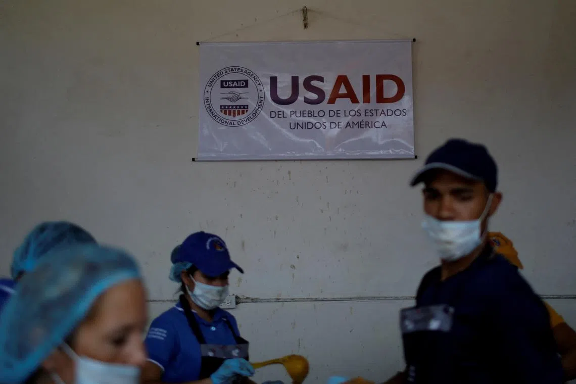 FILE PHOTO: The logo of USAID is seen at a community kitchen set-up by them and the World Food Programme in Cucuta, Colombia February 7, 2019. REUTERS/Marco Bello/File Photo