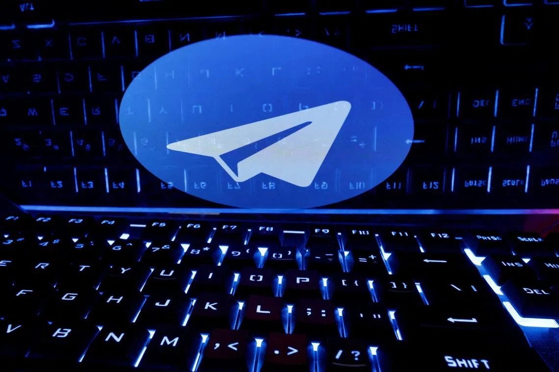 FILE PHOTO: A keyboard is placed in front of a displayed Telegram logo in this illustration taken February 21, 2023. REUTERS/Dado Ruvic/Illustration/File Photo/File Photo