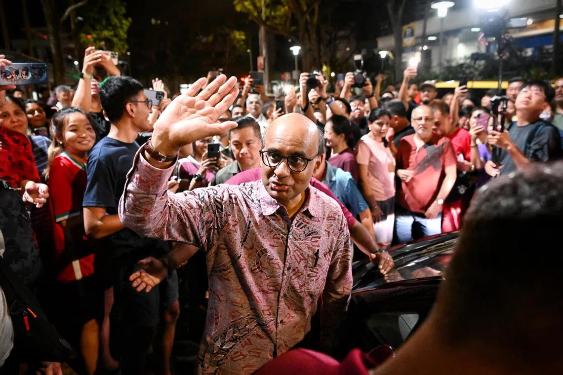 President-elect Tharman Shanmugaratnam together with his wife, Ms Jane Ittogi meeting his supporters at the Taman Jurong Market & Food Centre located at Yung Sheng Road on Sep 1, 2023. This was shortly before the sample count showed Mr Tharman clinching the presidency with a landslide win.