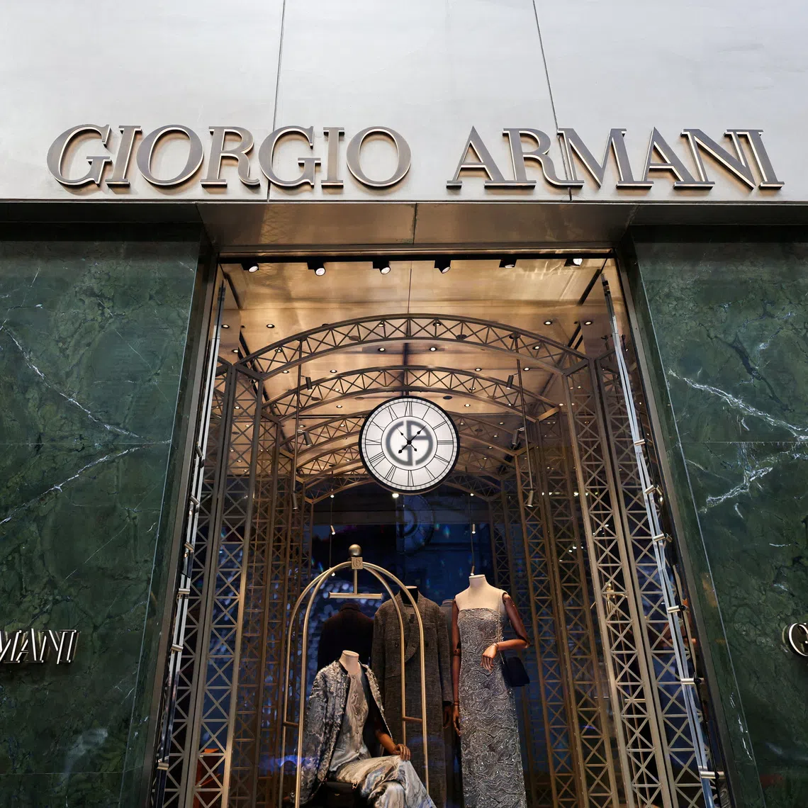 FILE PHOTO: A Giorgio Armani store in Milan, Italy, September 24, 2025. REUTERS/Yara Nardi/File Photo