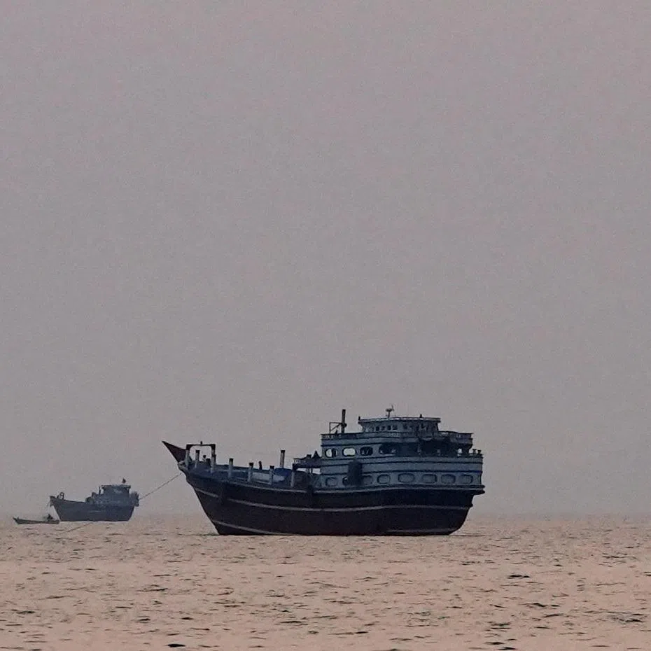 Vessels at the Strait of Hormuz, as seen from Musandam, Oman, July 21, 2026. REUTERS/Stringer