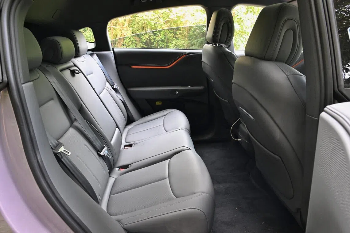 The adjustable rear bench is wide enough for three adults.