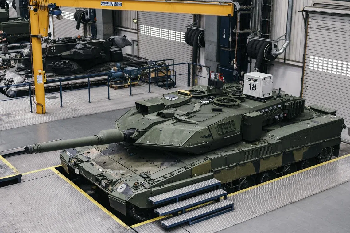 A Leopard 2 battle tank at a factory in Munich.  Germany had held back from sending these tanks to Ukraine or allowing other Nato countries to re-export them. 