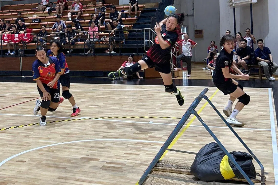 Singapore's Xiao Cheng Xin attempting a shot in the 36-21 win over Thailand A on July 12.