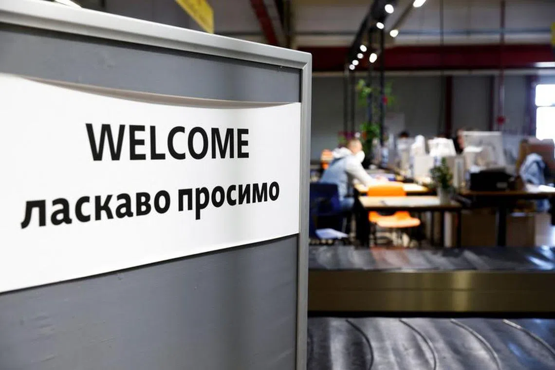 A view shows a welcome sign at the accommodation centre for refugees from Ukraine, as Russia's attack on Ukraine continues, at the former Tegel airport in Berlin, Germany, May 17, 2023. REUTERS/Michele Tantussi/File Photo