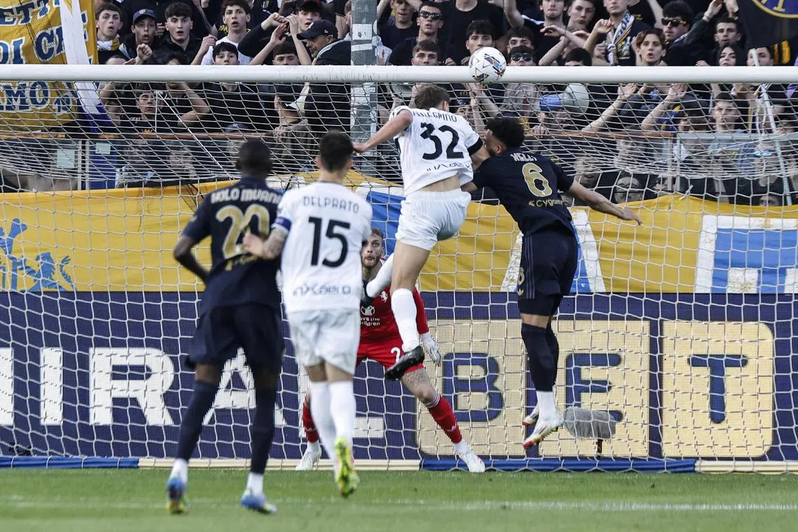 Parma's Mateo Pellegrino heading in the winner in the Italian Serie A soccer match against Juventus at Ennio Tardini stadium in Italy on April 23, 2025.
