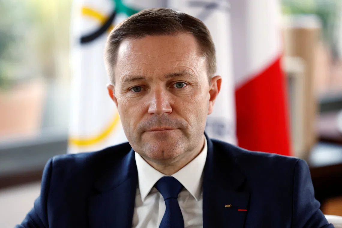 French Olympic Committee and International Cycling Union president David Lappartient attends an interview about his candidacy for the presidency of the International Olympic Committee (IOC), in Paris, France, March 13, 2025. REUTERS/Sarah Meyssonnier