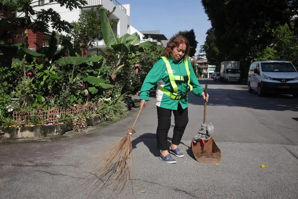 ST20221206_202209752674: Gin Tay / wkdaily/  Ng Wei Kai/
Profile of Mrs Tan Sien Tin 64, Senior Environmental Health Attendant, photograph at West Coast Place on Dec 6, 2022.
