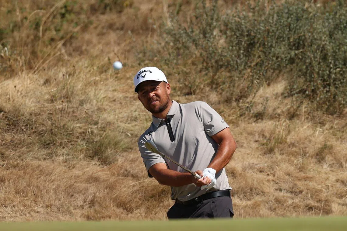 US golfer Xander Schauffele chips on to the 7th green on day four of the 154th Open Golf championship at Royal Birkdale Golf Club near Southport in north-west England on July 19, 2026.