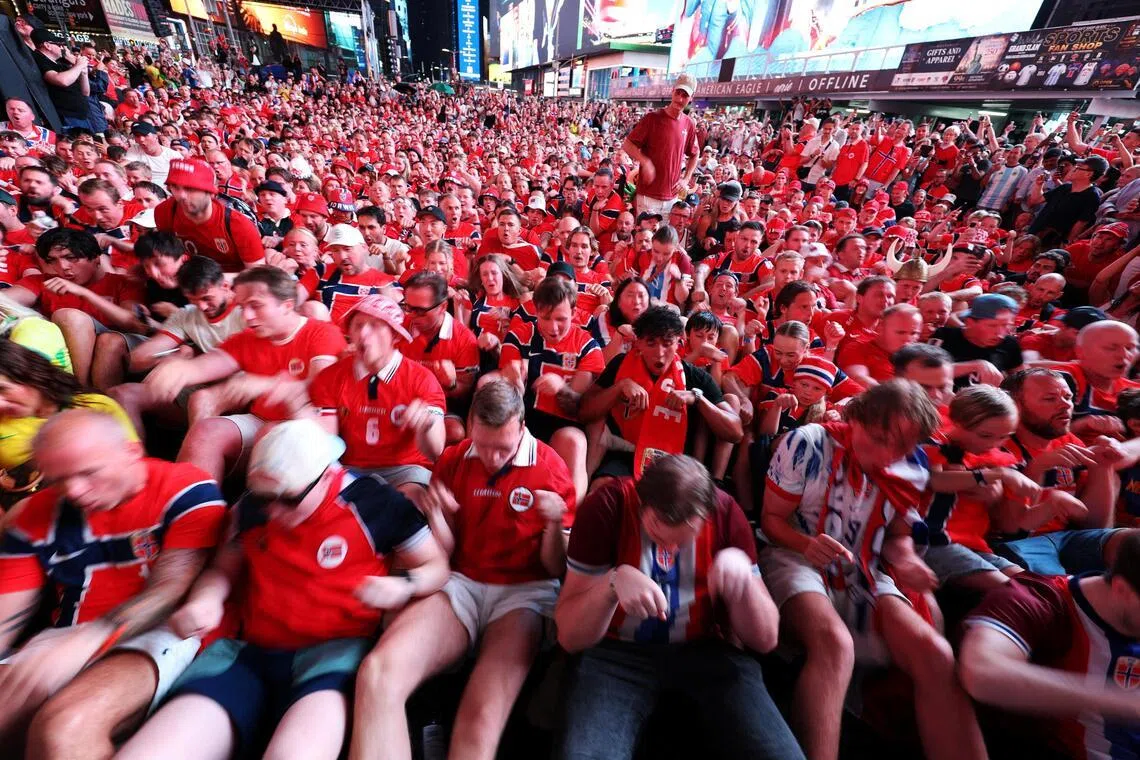 Norway fans performing the “Viking Row” at Times Square in New York on July 3.