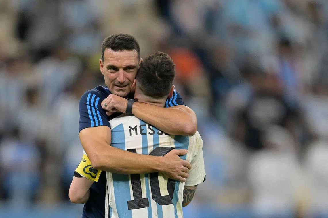 Argentina coach Lionel Scaloni embracing Lionel Messi after their win over Netherlands.