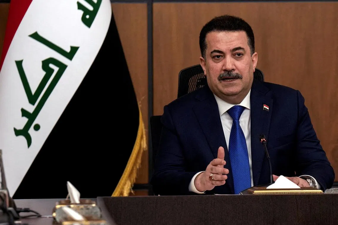 FILE PHOTO: Iraqi Prime Minister Mohammed Shia al-Sudani attends the first session of negotiations between Iraq and the United States to wind down the International Coalition mission in Baghdad, Iraq, January 27, 2024. Hadi Mizban/Pool via REUTERS/File Photo