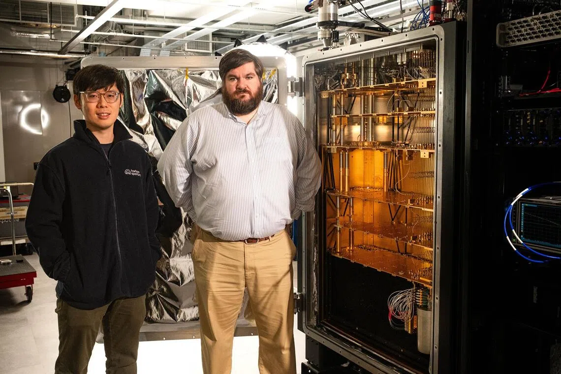 Horizon Quantum’s founder and chief executive Joe Fitzsimons (right) and principal engineer Kyle Chu with the quantum computer they assembled for $3 million.