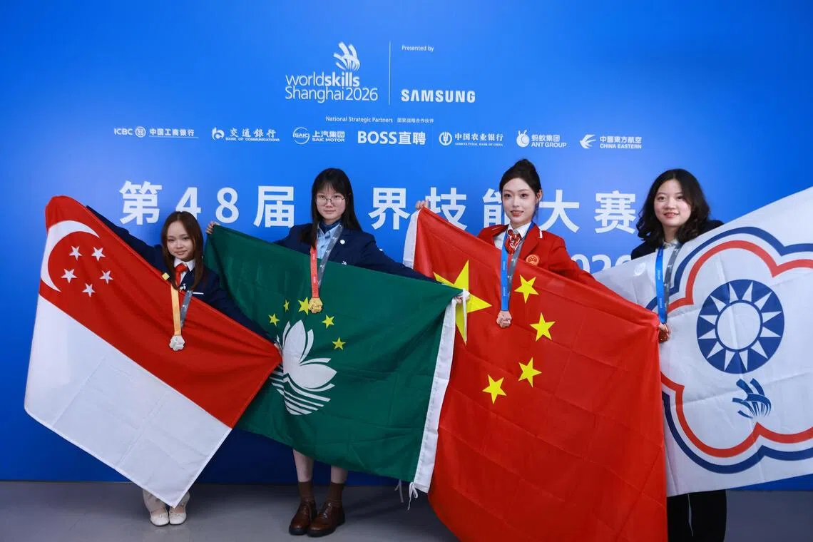 Sheryl Ong from Nanyang Polytechnic (far left) won silver in visual merchandising, competing against 11 others.