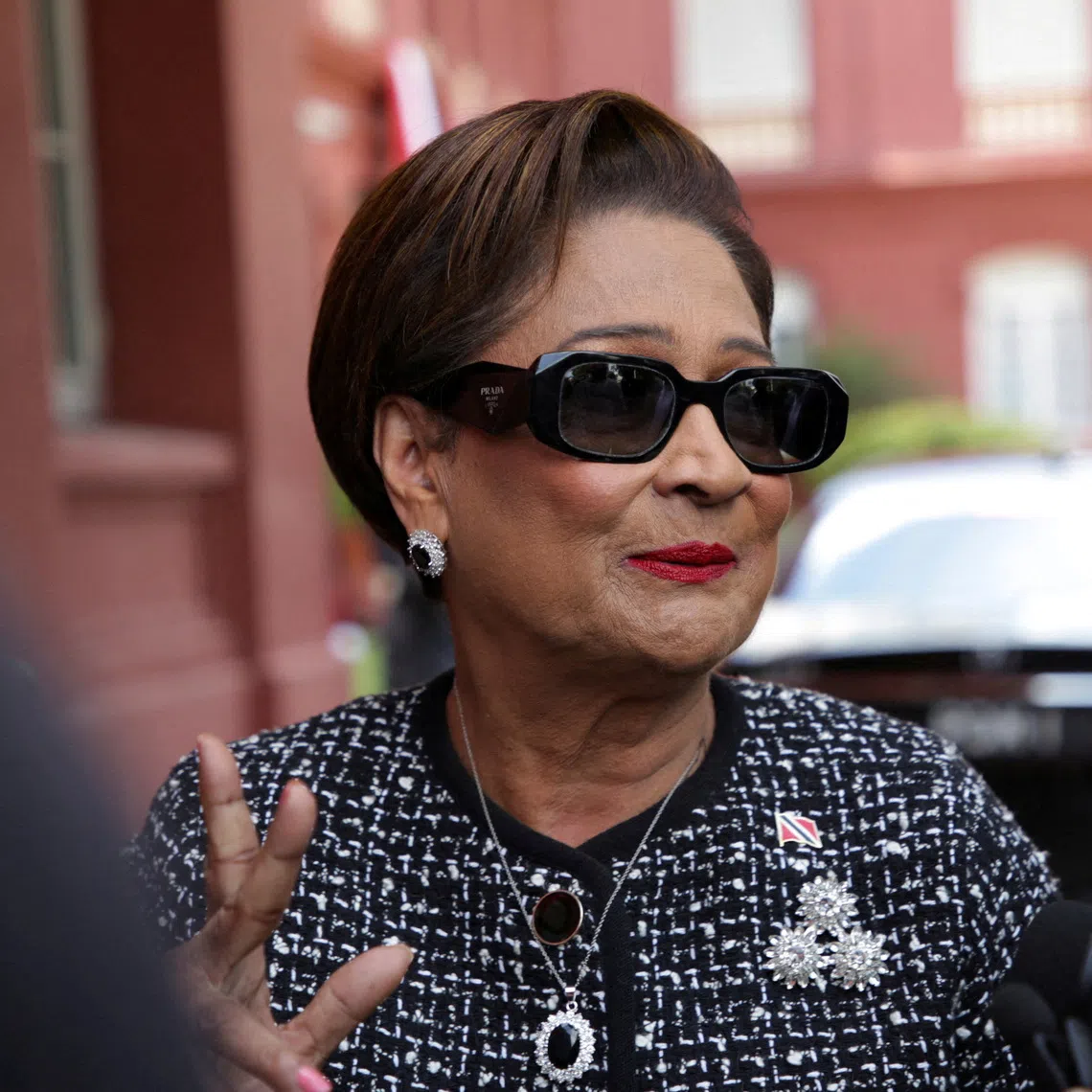 FILE PHOTO: Prime Minister of Trinidad and Tobago Kamla Persad-Bissessar replies to the media after being asked about the presence of U.S. military in the southern Caribbean, at the Red House, parliamentary building, in Port of Spain, Trinidad and Tobago, September 12, 2025. REUTERS/Andrea De Silva/File Photo