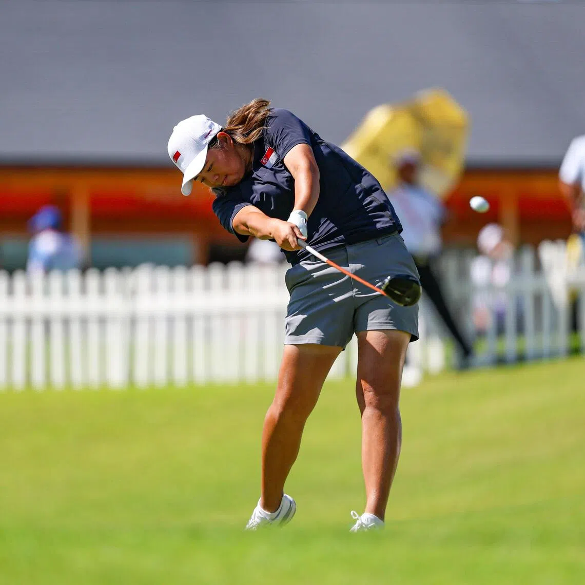 Singapore’s Shannon Tan leads the Asian Games women’s individual golf event after Round 1.
