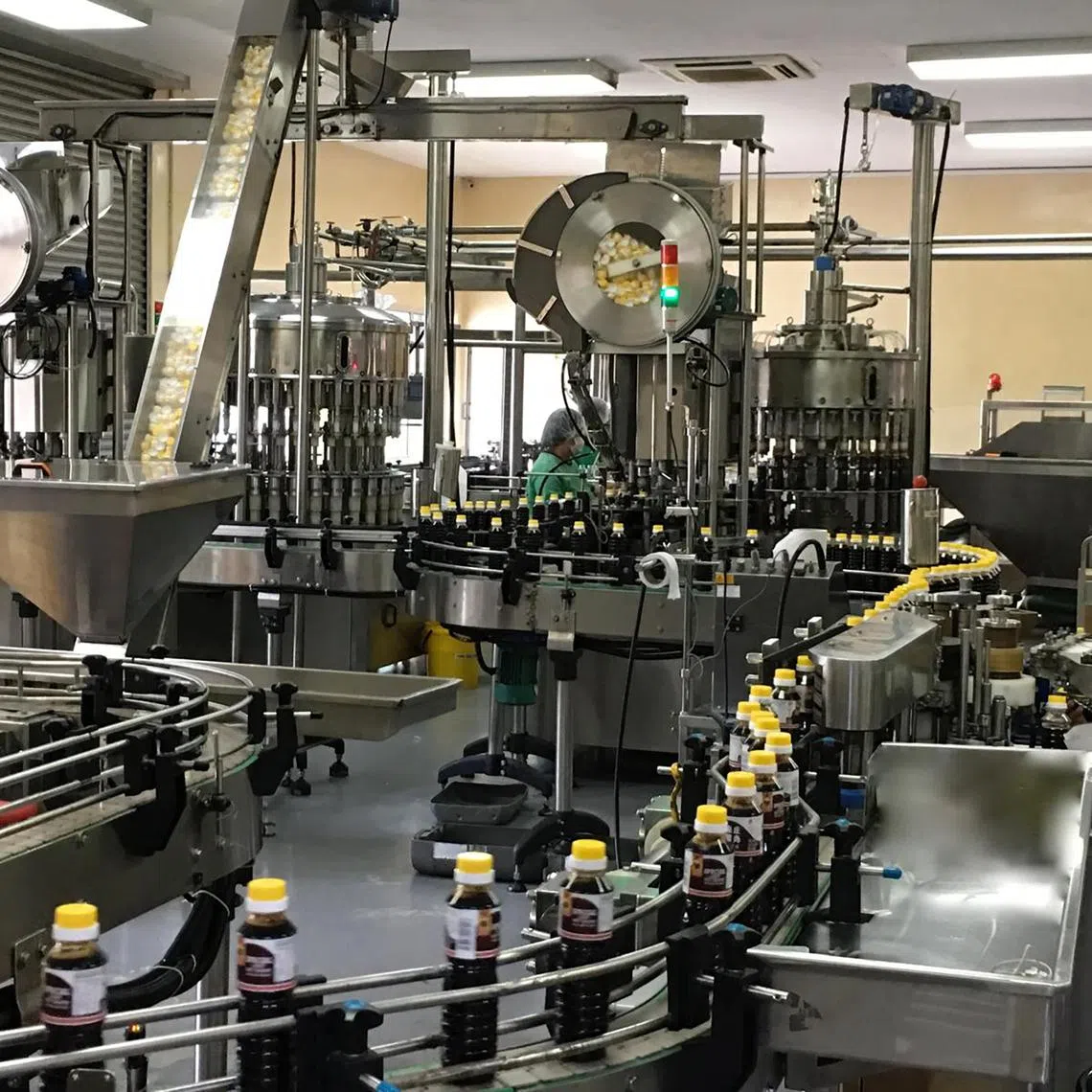 Tai Hua Food Industries' packaging line for Tai Hua soya sauce at its 12 Jalan Besut factory in Jurong district.