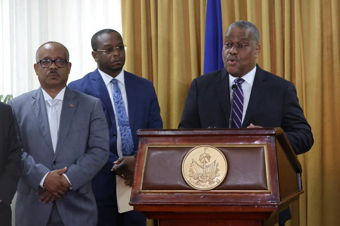 Garry Conille addresses the audience during a ceremony with members of the transition council, where he is presented as Haiti's interim Prime Minister, in Port-au-Prince, Haiti June 3, 2024. REUTERS/Ralph Tedy Erol