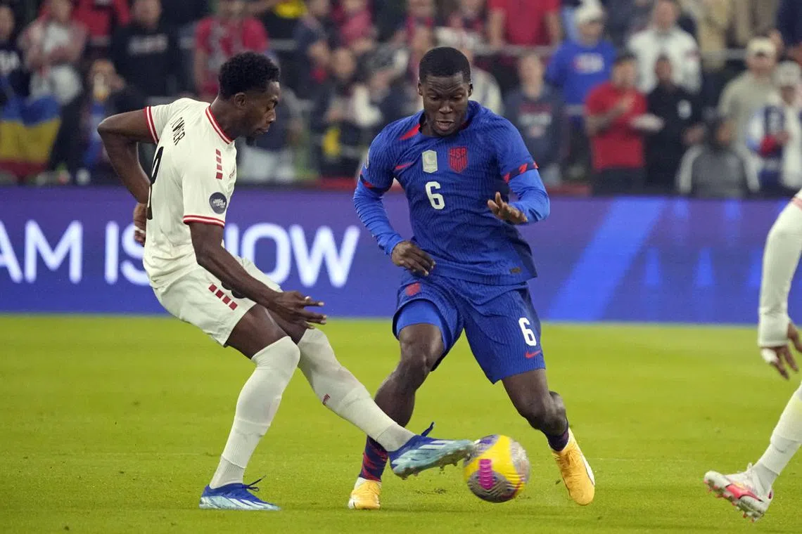 FILE PHOTO: Nov 16, 2023; Austin, Texas, USA; U.S. Men's National team midfielder Yunus Musah (6) and Trinidad and Tobago midfielder Noah Powder (8) battle for the ball during the first half in the Concacaf Quarterfinal at Q2 Stadium. Mandatory Credit: Scott Wachter-USA TODAY Sports/File Photo