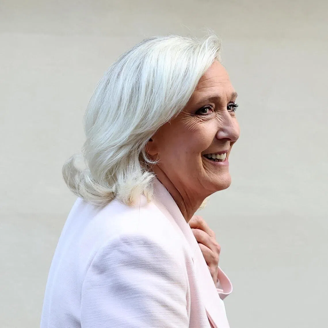 French far-right leader Marine Le Pen, member of parliament for the Rassemblement National (National Rally - RN) party, leaves after a party meeting at the Rassemblement National headquarters following the verdict in her appeal trial, alongside the RN party itself and 10 others defendants found guilty of diverting European Parliament funds, in Paris, France, July 7, 2026. REUTERS/Stephane Mahe