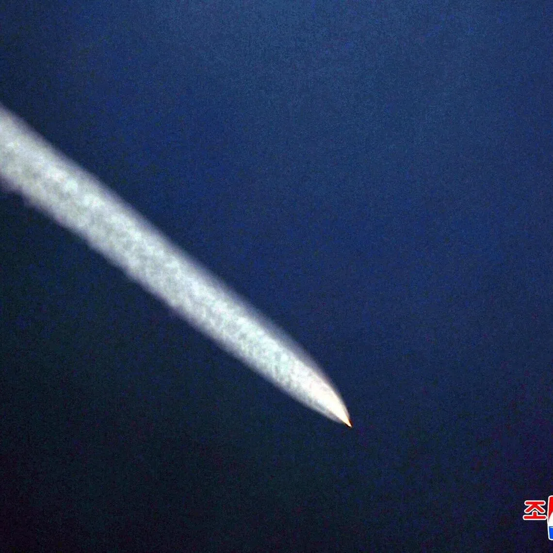 An object that appears to be a missile flies through the air, as the Missile General Bureau of North Korea claims they successfully conducted a test of a major weapons system on October 22, 2025, at an unspecified location, in this photo released by North Korea's official Korean Central News Agency on October 23, 2025. 