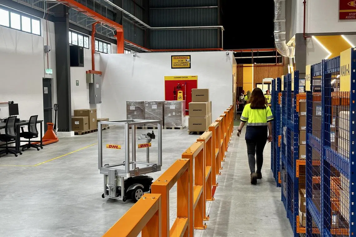 stdhl - A robot picker follows a DHL Supply Chain worker to extract sensitive equipment for a semiconductor client from the firm’s Penang Logistics Hub 4. 


Credit: Shannon Teoh