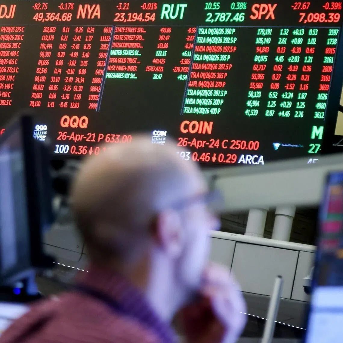 Traders working on the floor of the American Stock Exchange at the New York Stock Exchange (NYSE) in New York on  April 20, 2026. 