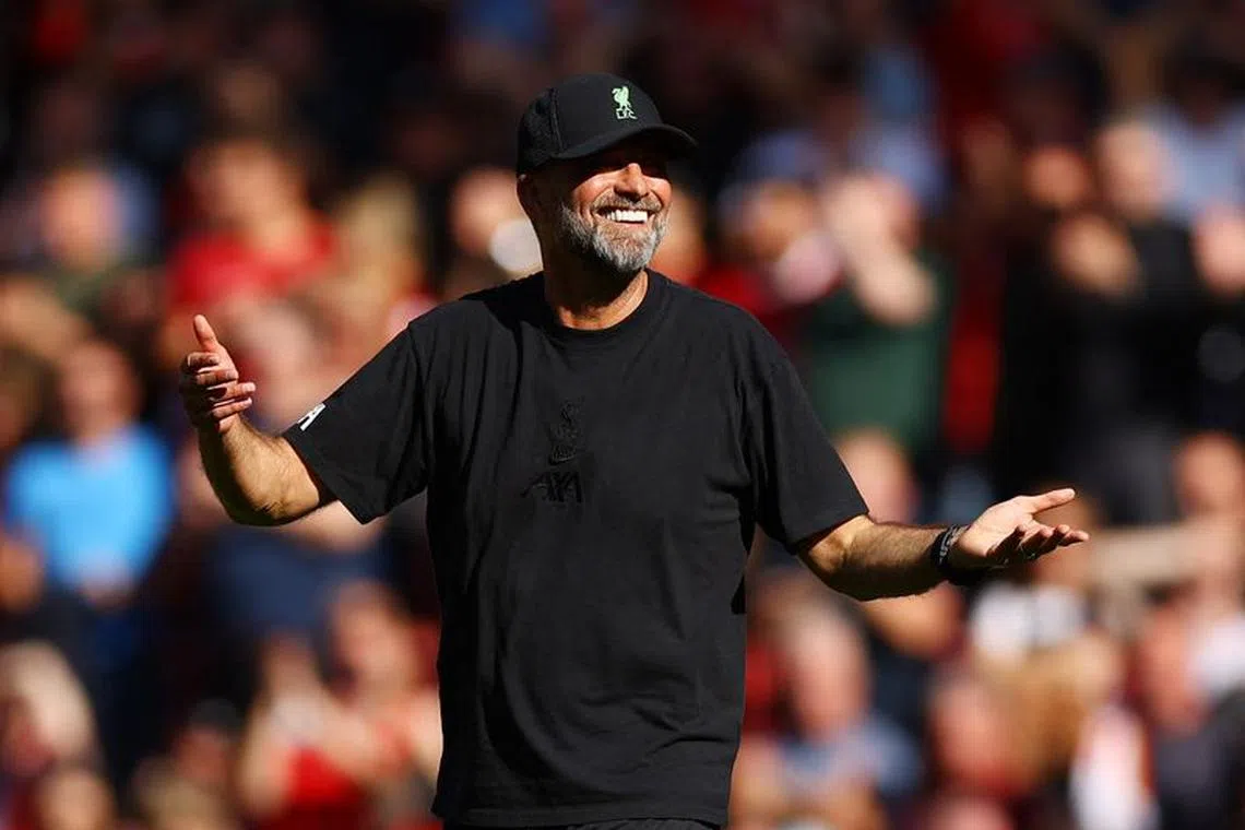 Soccer Football - England - Premier League - Liverpool v Aston Villa - Anfield, Liverpool, Britain - September 3, 2023 Liverpool manager Juergen Klopp celebrates after the match REUTERS/Molly Darlington/File photo