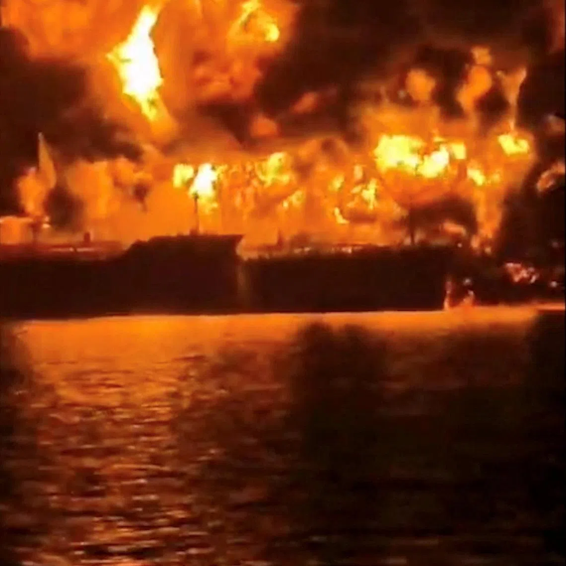 A ship burns, after Iranian explosive-laden boats appear to have attacked two fuel tankers in Iraqi waters setting them ablaze, according to port, maritime security and risk firms, amid the U.S.-Israeli conflict with Iran, in this screengrab taken from a handout video released March 12, 2026.     Media Office of Iraqi Ports/Handout via REUTERS