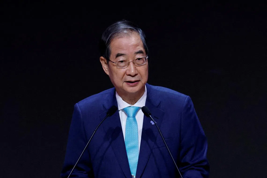 FILE PHOTO: Han Duck-soo, South Korean Prime Minister, gives a speech during the opening ceremony of the AI Global Forum in Seoul, South Korea, May 22, 2024. REUTERS/Kim Soo-hyeon/File Photo