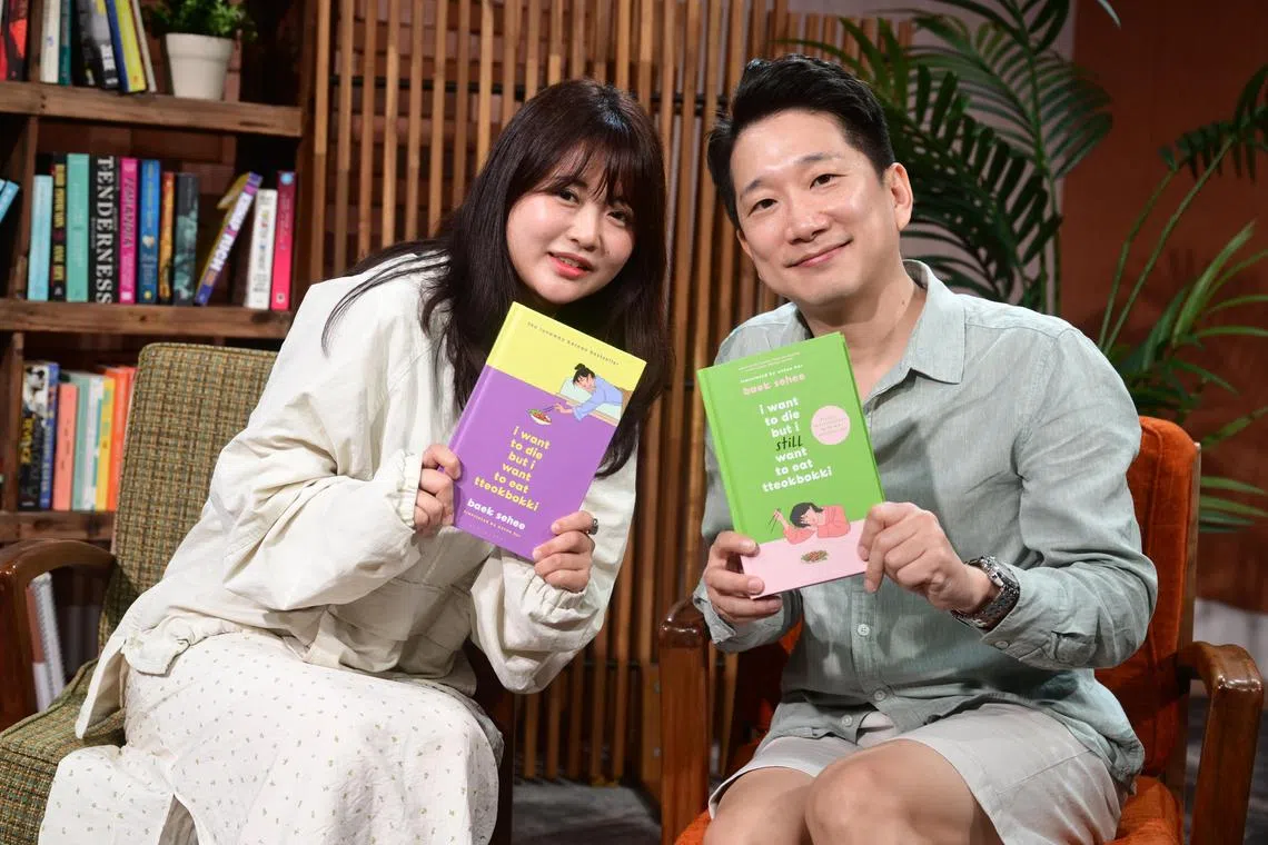 ST20241117_202407000446 shbaek Azmi Athni/ Shawn Hoo//

(From left) ST Life's Shawn Hoo interviews best-selling author of I Want To Die But I Want To Eat Tteokbokki Baek Sehee and her translator Anton Hur, who has been twice longlisted for the International Booker Prize.

ST PHOTO: AZMI ATHNI
