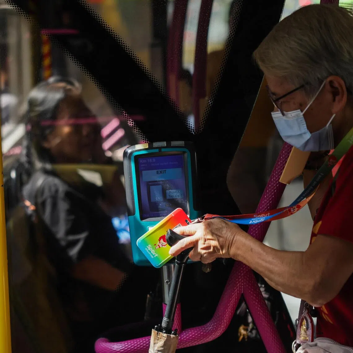 ST20251014_202510800698: Gin Tay/ ntexpress14/Lee Nian Tjoe/
Commuters tapping out of the card reader as they alight the bus on Oct 14, 2025.
Can use for stories on public transportation, fare hike, bus, SMRT, commuters, petrol, diesel, electricity, SimplyGo, digital payment, EZlink card, 