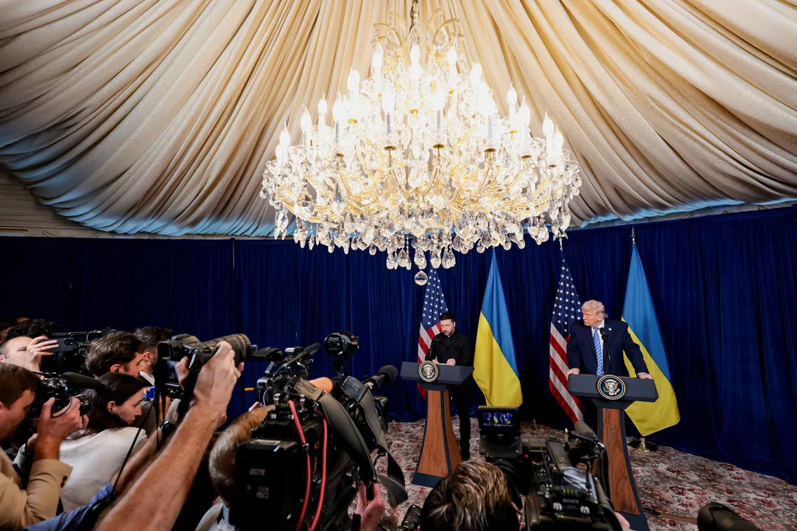 U.S. President Donald Trump and Ukrainian President Volodymyr Zelenskiy hold a press conference after their lunch meeting at Trump’s Mar-a-Lago club, in Palm Beach, Florida, U.S., December 28, 2025. REUTERS/Jonathan Ernst