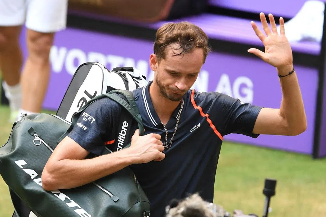 Russia's Daniil Medvedev leaves the centre court after losing against Spain's Roberto Bautista Agut.