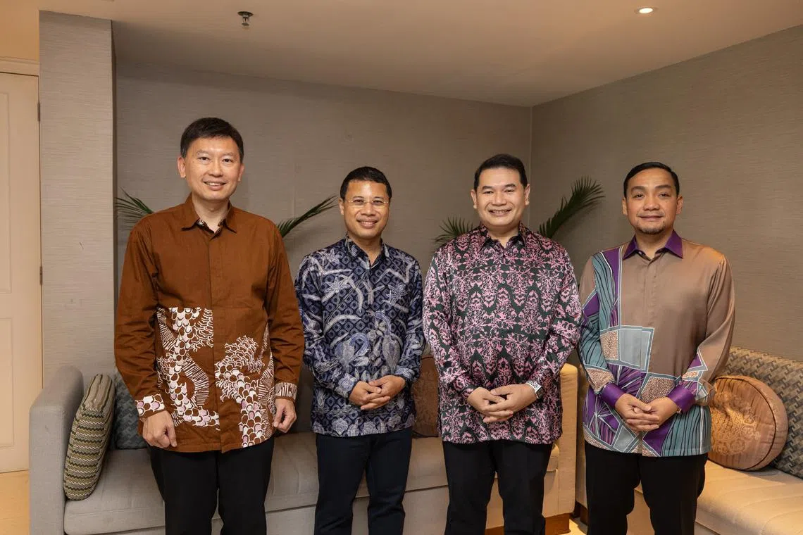 Singapore's National Development Minister, Mr Desmond Lee (second from left) met with Malaysia's Economy Minister, Mr Rafizi Ramli (second from right) along with Minister for Transport, Chee Hong Tat (left) and Johor Chief Minister Datuk Onn Hafiz Ghazi, to advance discussions on the Johor-Singapore Special Economic Zone at the Amari Hotel, Johor Bahru on Nov 7.