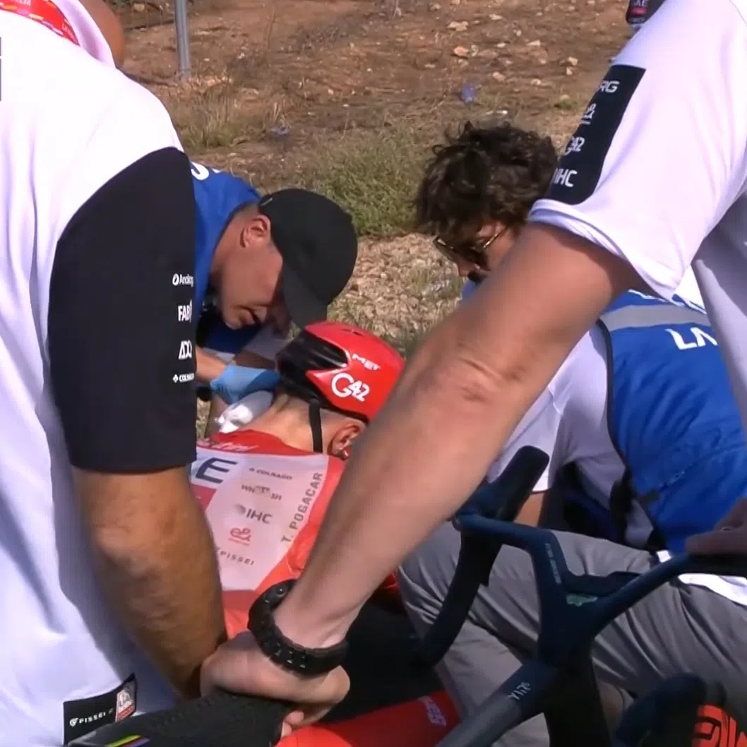 A heavy fall during the flat eighth stage of the Vuelta a Espana left Team UAE’s Tadej Pogacar with shoulder and face injuries.