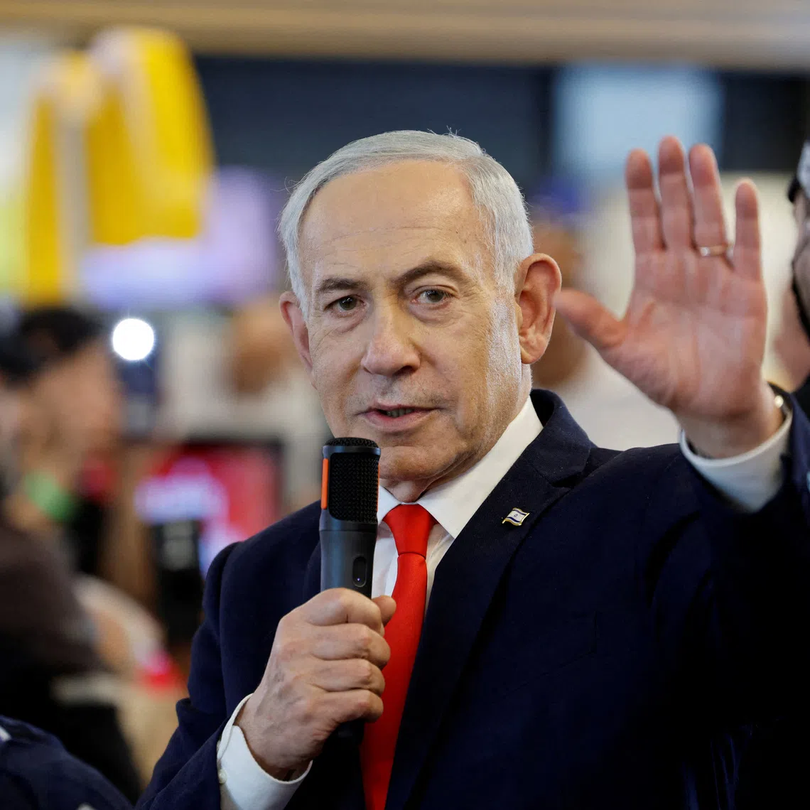 Israeli Prime Minister Benjamin Netanyahu meeting members of the public at a mall in Ramla on Oct 19, ahead of Israel’s national election.