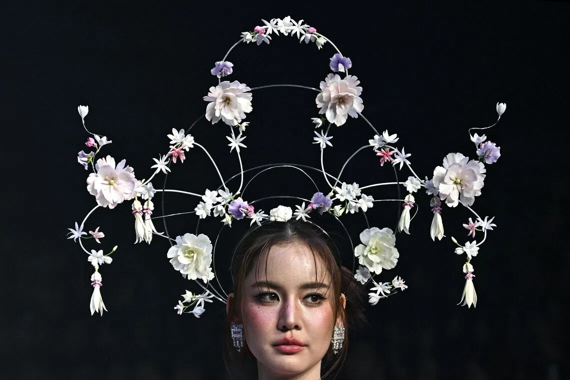 Thai singer and actress Maylada “Bow” Susri presenting a creation by ISSUE for the Autumn/Winter 2025 collection during Bangkok International Fashion Week 2025 at Siam Paragon, in Bangkok, on Oct 16, 2025. 