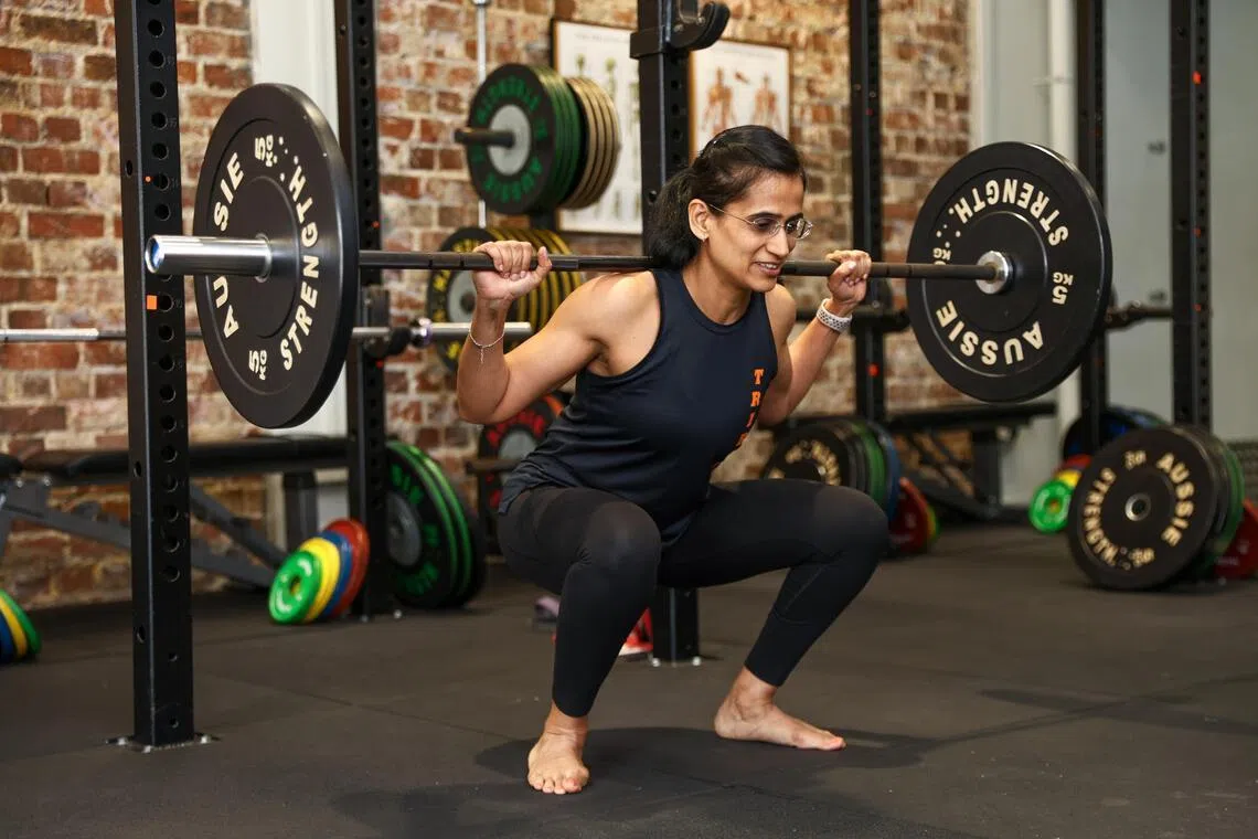 When lifting weights, Mehta goes barefoot. This helps her to avoid compensating for the bunion.