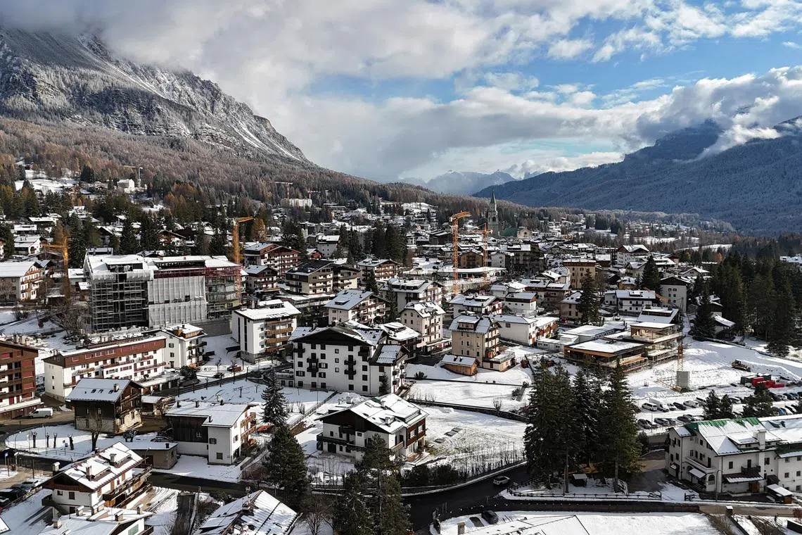 FILE PHOTO: Olympics - 2026 Milano-Cortina Winter Olympics -  A drone view shows Cortina, a host town of the Milano Cortina Winter Olympic Games 2026, in Cortina, Italy - November 21, 2025 REUTERS/Claudia Greco/File Photo