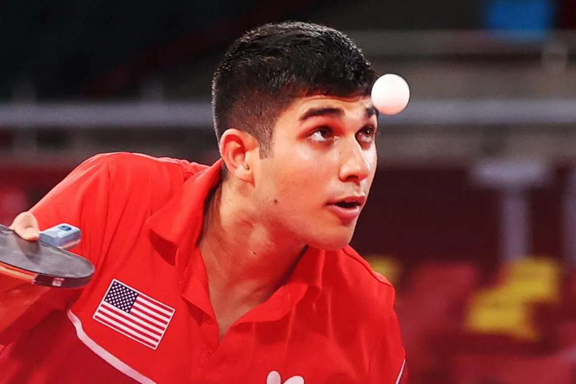 FILE PHOTO: Tokyo 2020 Olympics - Table Tennis - Men's Singles - Round 2 - Tokyo Metropolitan Gymnasium - Tokyo, Japan - July 26, 2021.  Kanak Jha of the United States in action against Kirill Skachkov of the Russian Olympic Committee REUTERS/Luisa Gonzalez/File Photo