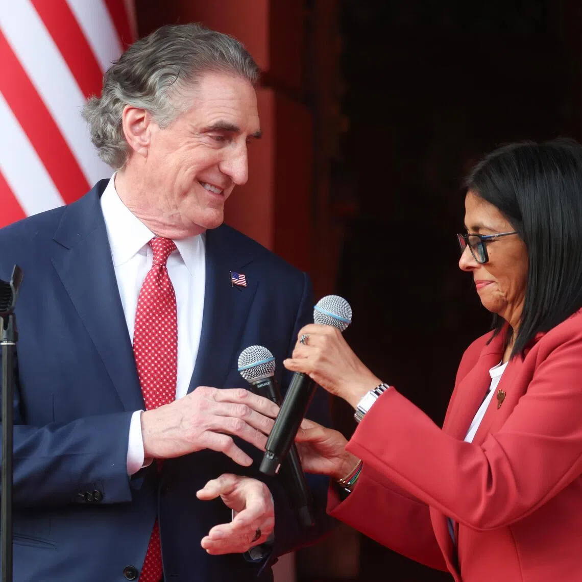 Venezuela's acting President Delcy Rodriguez (right) reacts alongside US Secretary of the Interior Doug Burgum in Caracas, Venezuela, on March 4.
