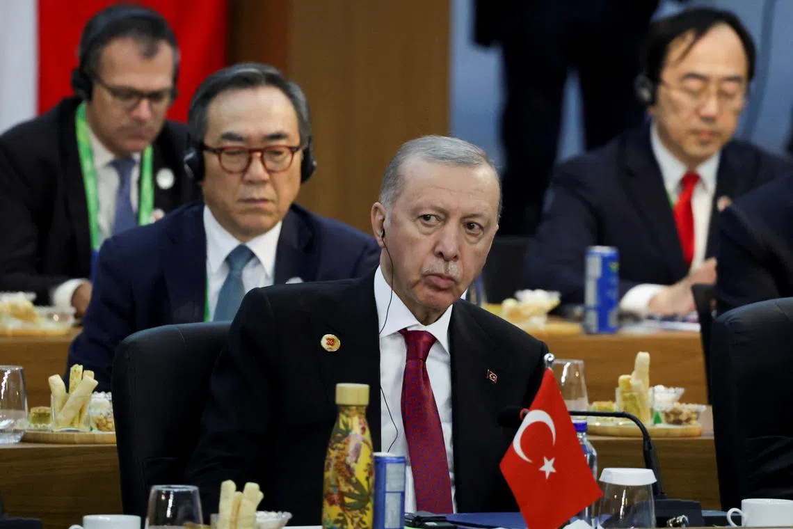 FILE PHOTO: Turkish President Tayyip Erdogan attends the G20 summit at the Museum of Modern Art in Rio de Janeiro, Brazil, November 18, 2024. REUTERS/Ricardo Moraes/File Photo