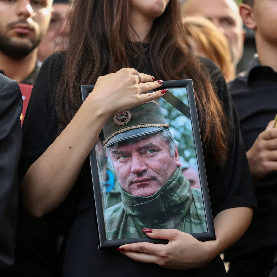 People attend a funeral of former Bosnian Serb wartime general Ratko Mladic at the Topcider Cemetery in Belgrade, Serbia, September 7, 2026. REUTERS/Zorana Jevtic